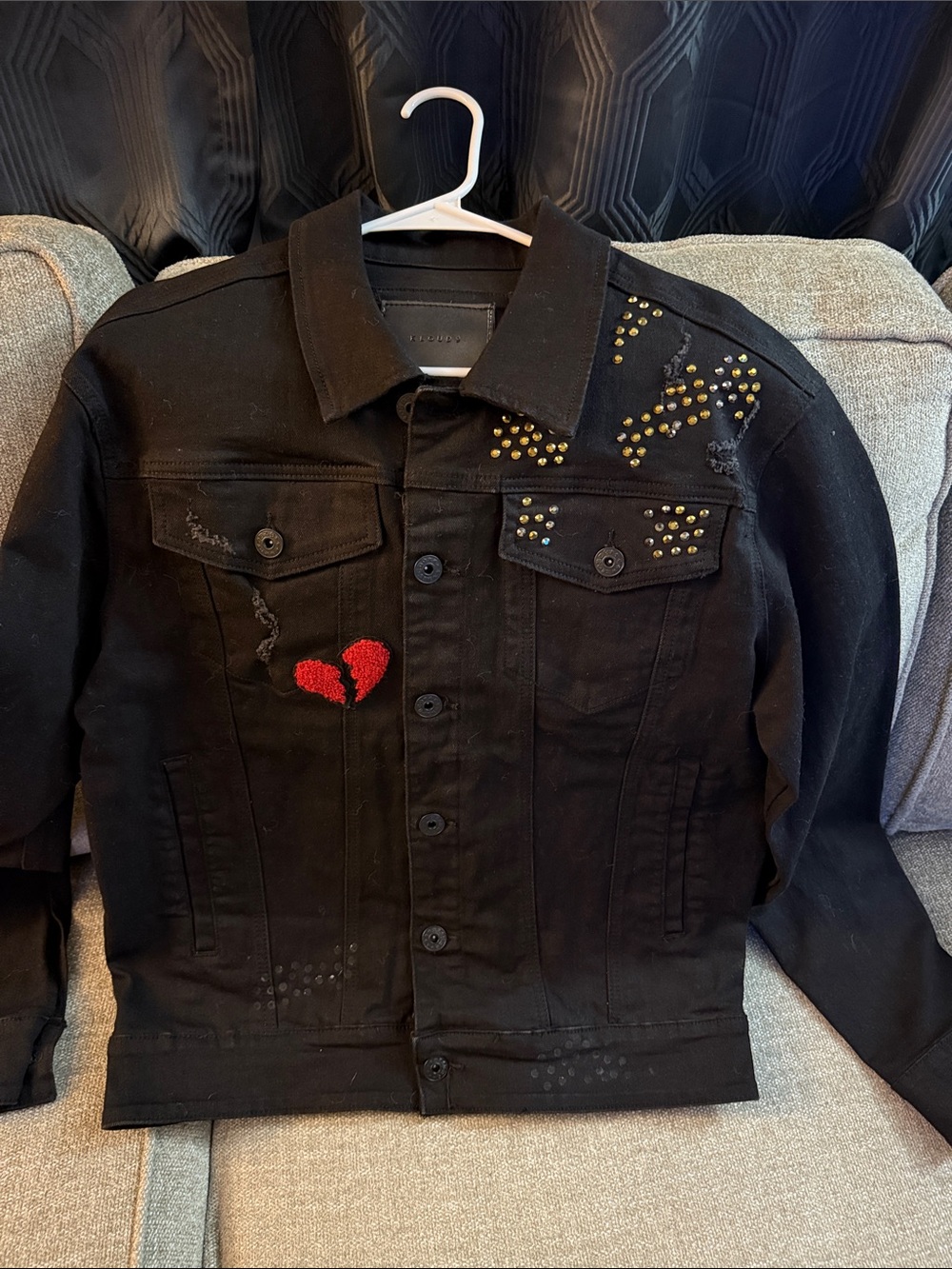 Black Stud-Embellished Denim Jacket with Red Heart Accent